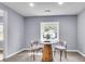 Bright dining area features neutral walls, recessed lights, and a wooden table for intimate meals at 1723 River Front Dr, Charleston, SC 29407