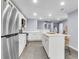 Spacious kitchen with stainless steel appliances, quartz counters, and a center island at 1723 River Front Dr, Charleston, SC 29407