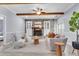 Cozy living room with brick fireplace, built-in shelves, and comfortable seating arrangements at 1723 River Front Dr, Charleston, SC 29407