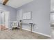 Light-filled living room features sleek flooring, a modern console table, and comfortable seating at 1723 River Front Dr, Charleston, SC 29407