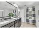 Stylish bathroom with double sinks, granite countertops, and natural light at 1782 Towne St, Johns Island, SC 29455