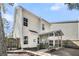 Rear exterior view of home featuring a screened porch and well-maintained siding at 1782 Towne St, Johns Island, SC 29455