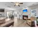 Open-concept living space with hardwood floors, fireplace, and comfortable seating at 1782 Towne St, Johns Island, SC 29455