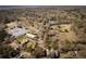 Aerial view of neighborhood with many trees and houses at 1981 Central Park Rd, Charleston, SC 29412