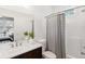 Well-lit bathroom with a shower-tub combo and a white vanity at 1981 Central Park Rd, Charleston, SC 29412