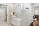 Bathroom with stackable washer and dryer and a shower and bathtub combination at 1981 Central Park Rd, Charleston, SC 29412