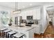Bright and airy kitchen with an island, stainless steel appliances, and ample cabinet space at 1981 Central Park Rd, Charleston, SC 29412