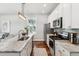 Modern kitchen with stainless steel appliances and a large island with granite countertops at 1981 Central Park Rd, Charleston, SC 29412