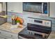 Modern kitchen featuring sleek stainless steel appliances and marble countertops at 1981 Central Park Rd, Charleston, SC 29412