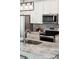Well-equipped kitchen with stainless steel appliances, white cabinets, and granite countertops at 1981 Central Park Rd, Charleston, SC 29412