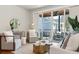 Comfortable living room with stylish furniture, sliding glass doors to the balcony, and ample natural light at 1981 Central Park Rd, Charleston, SC 29412