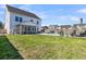 Large backyard features a pool and screened-in porch at 201 Garden Lily Lane, Summerville, SC 29485