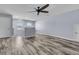Bonus room with neutral paint, ceiling fan, and wood-look floors at 201 Garden Lily Lane, Summerville, SC 29485