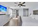 Bright main bedroom with ample closet space, ceiling fan, and hardwood style floors at 201 Garden Lily Lane, Summerville, SC 29485