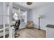 Bright office space with natural light, a comfortable chair, and a modern desk at 201 Garden Lily Lane, Summerville, SC 29485