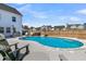 Backyard in-ground pool with fence at 201 Garden Lily Lane, Summerville, SC 29485