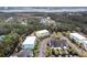 Scenic aerial view showcases homes surrounded by water features, dense foliage, and beautifully maintained landscaping at 2032 Amenity Park Dr, Mount Pleasant, SC 29466