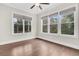 Bedroom featuring hardwood floors and bright natural light from multiple windows at 2032 Amenity Park Dr, Mount Pleasant, SC 29466