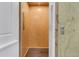 Private residential elevator with wood interior and contrasting wood grain flooring at 2032 Amenity Park Dr, Mount Pleasant, SC 29466