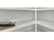 Empty white shelves in a home's closet at 2032 Amenity Park Dr, Mount Pleasant, SC 29466