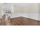 Inviting formal living room with hardwood floors and classic wall paneling details at 2032 Amenity Park Dr, Mount Pleasant, SC 29466