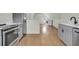 Bright kitchen space featuring modern appliances and washer and dryer hookups at 2097 Mt Pleasant St, Charleston, SC 29403
