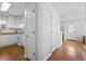Hallway view showcasing the kitchen and the doorway leading to the dining area at 25 Oak Forest Dr, Charleston, SC 29407
