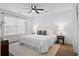 Inviting main bedroom features a large window, ceiling fan, and neutral decor at 25 Oak Forest Dr, Charleston, SC 29407