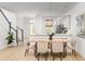 Open-concept dining area and kitchen space with stylish decor and natural light at 209 Abercom Place Dr, Moncks Corner, SC 29461