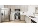 Kitchen area boasting stainless appliances, light cabinets, and a sleek design at 209 Abercom Place Dr, Moncks Corner, SC 29461