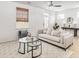 Bright living room with a comfortable sofa, stylish coffee tables, and neutral decor at 209 Abercom Place Dr, Moncks Corner, SC 29461