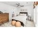 Relaxing main bedroom with a ceiling fan, warm wood accents, and neutral color palette at 209 Abercom Place Dr, Moncks Corner, SC 29461