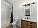 Charming bathroom featuring a wood vanity, black hardware, and modern fixtures at 3003 Yachtsman Dr, Mount Pleasant, SC 29466