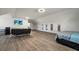 Open bedroom boasts vaulted ceilings, seating area, and artistic wall décor at 3003 Yachtsman Dr, Mount Pleasant, SC 29466