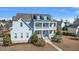 Charming two-story home with a welcoming double porch and a manicured lawn at 3003 Yachtsman Dr, Mount Pleasant, SC 29466