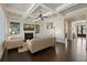 Elegant living room with coffered ceilings, fireplace, built-in shelves, and hardwood floors for a refined living space at 3003 Yachtsman Dr, Mount Pleasant, SC 29466