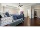 Inviting main bedroom with tray ceilings, hardwood floors, and a neutral color scheme at 3003 Yachtsman Dr, Mount Pleasant, SC 29466