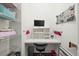 Compact office nook featuring a built-in desk, shelving, and storage for schoolwork and supplies at 3003 Yachtsman Dr, Mount Pleasant, SC 29466
