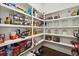 Well-organized walk-in pantry with ample shelving for food storage at 3003 Yachtsman Dr, Mount Pleasant, SC 29466