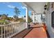 Relaxing front porch with rocking chairs and a view of the neighborhood at 3003 Yachtsman Dr, Mount Pleasant, SC 29466