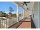 Inviting porch provides ample outdoor space with beautiful neighborhood views at 3003 Yachtsman Dr, Mount Pleasant, SC 29466