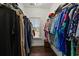 Spacious walk-in closet with custom shelving and window at 3003 Yachtsman Dr, Mount Pleasant, SC 29466