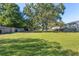 Spacious backyard offers plenty of green space and potential for outdoor activities at 303 Lakeside Dr # C-2, Mount Pleasant, SC 29464