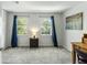 Bright bedroom boasts carpet, natural light, and neutral paint at 303 Lakeside Dr # C-2, Mount Pleasant, SC 29464