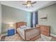 Comfortable bedroom featuring hardwood furniture, neutral colors, and ample natural light at 311 Citation Way, Moncks Corner, SC 29461