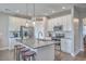 Beautiful kitchen with granite countertops, stainless steel appliances, kitchen island and pendant lighting at 311 Citation Way, Moncks Corner, SC 29461
