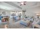 Inviting open-concept living space featuring modern decor and a seamless flow to the kitchen and dining area at 311 Citation Way, Moncks Corner, SC 29461