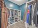 Spacious walk-in closet with custom shelving and clothing racks, providing ample storage space at 311 Citation Way, Moncks Corner, SC 29461
