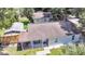 Aerial view of a cozy home featuring a covered patio and lush greenery at 3316 Island Estates Dr, Johns Island, SC 29455