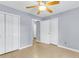 Comfortable bedroom with neutral walls, tile floors and closet space, creating a serene retreat at 3316 Island Estates Dr, Johns Island, SC 29455